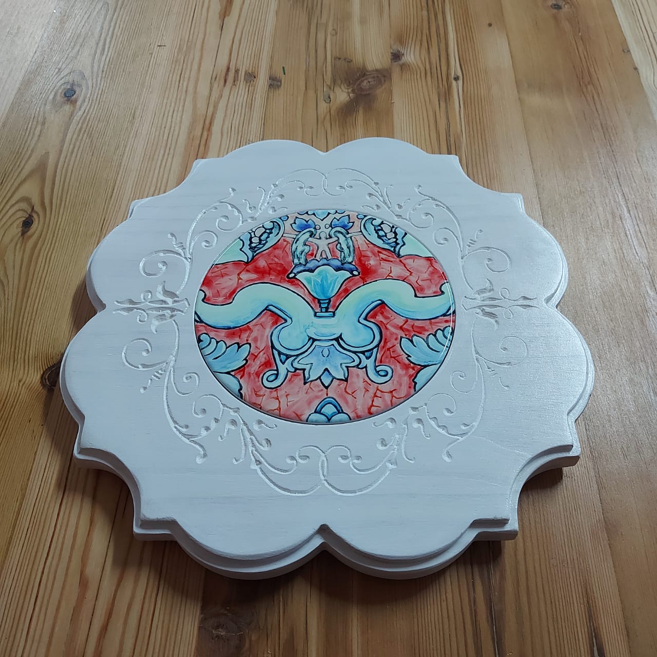 Engraved ornate board with tile