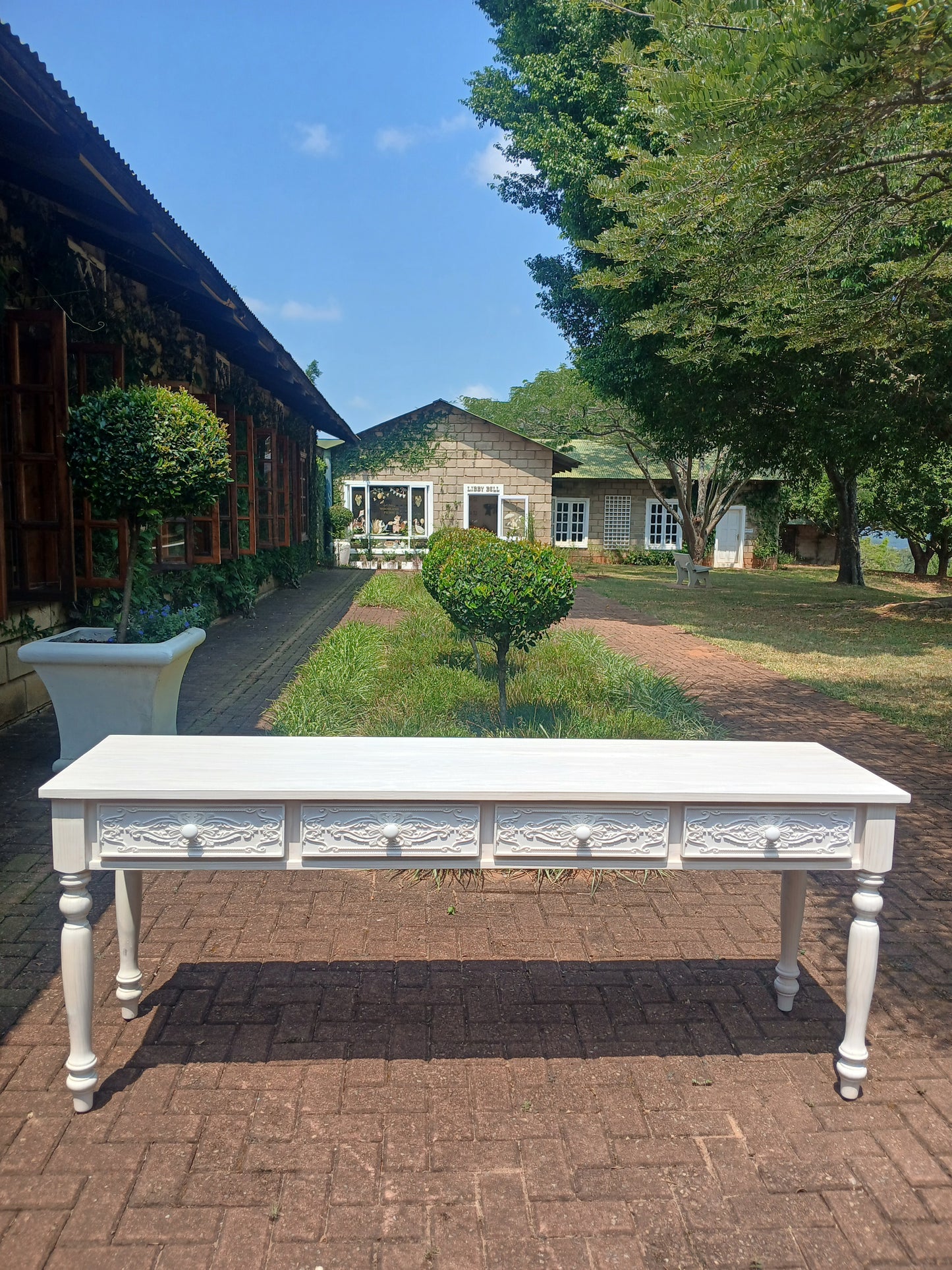 Whitewashed Carved 4 drawer server.