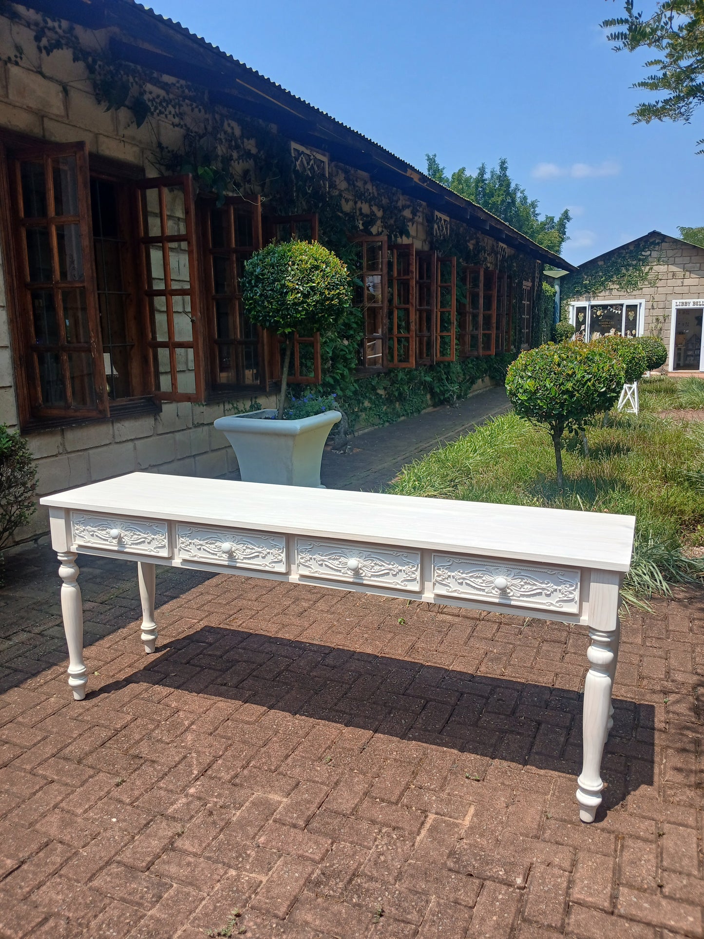 Whitewashed Carved 4 drawer server.