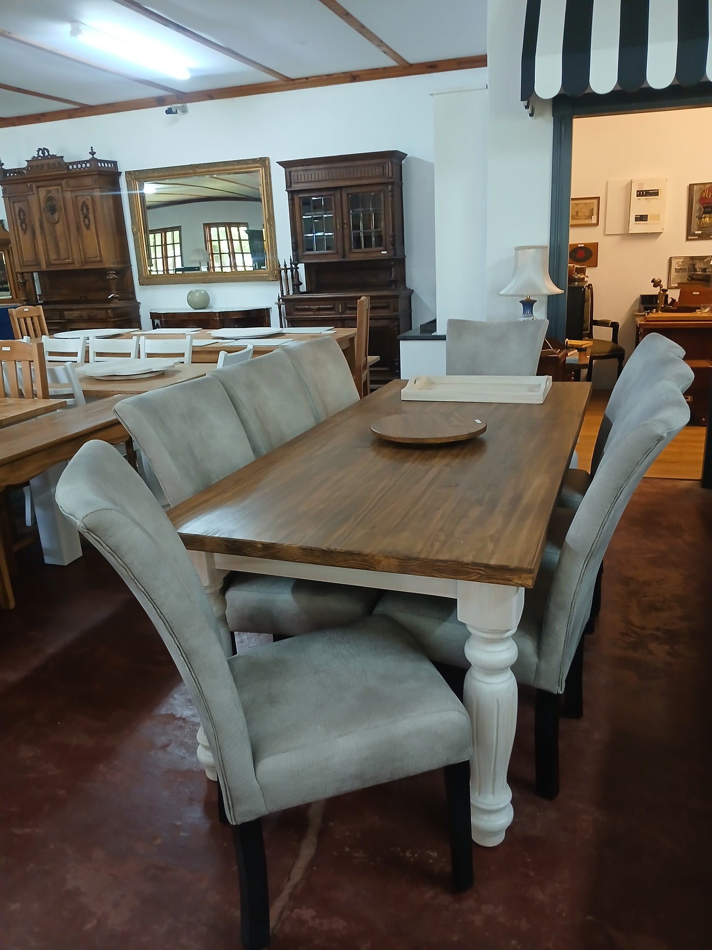 Two-Tone Dining Table with Upholstered