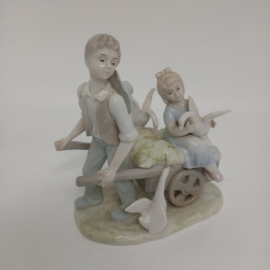 Boy ,girl & ducks Capodimonte figurine