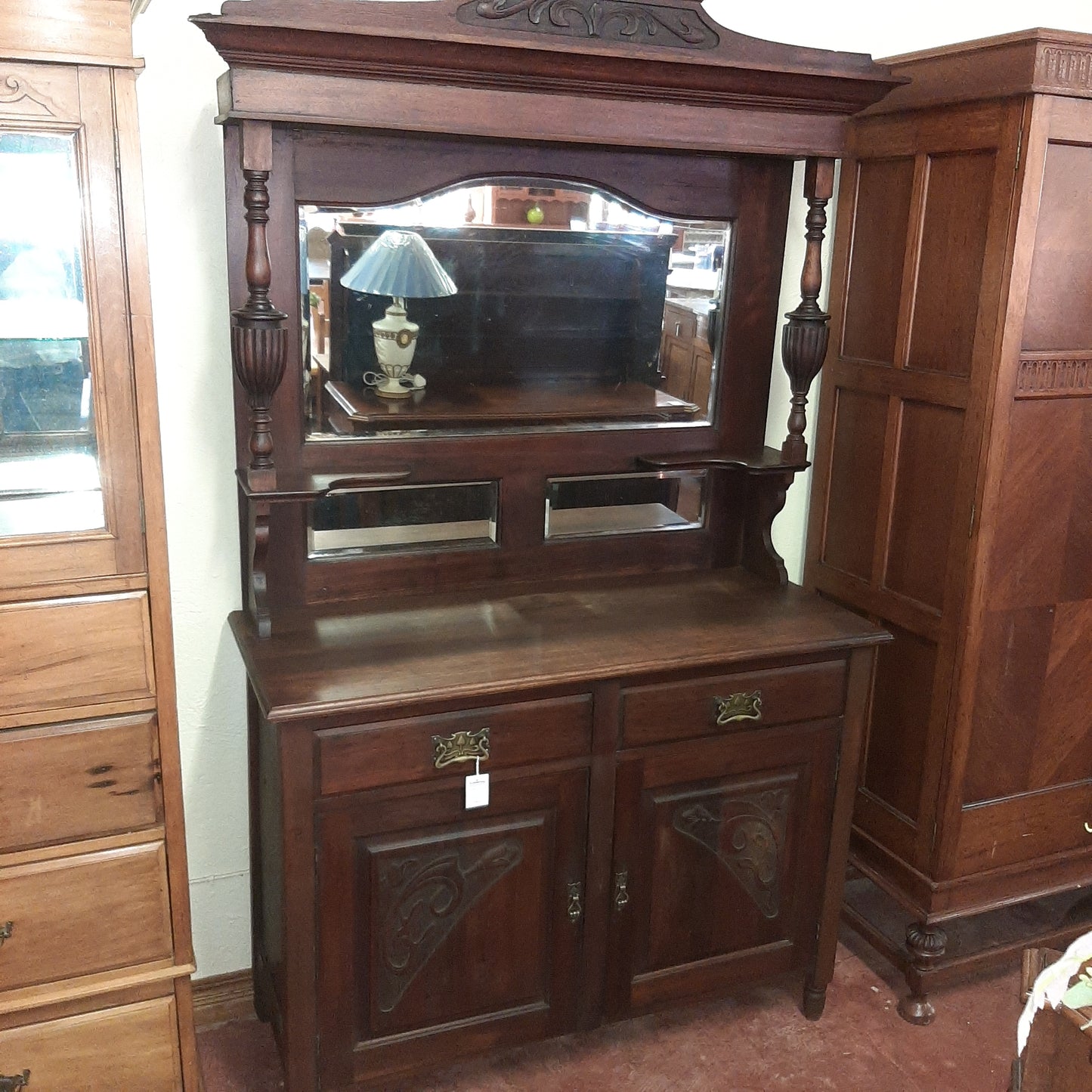Carved dresser with mirror