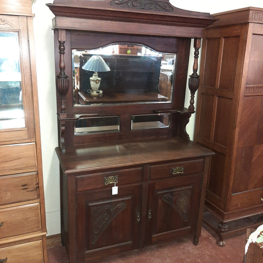 Carved dresser with mirror