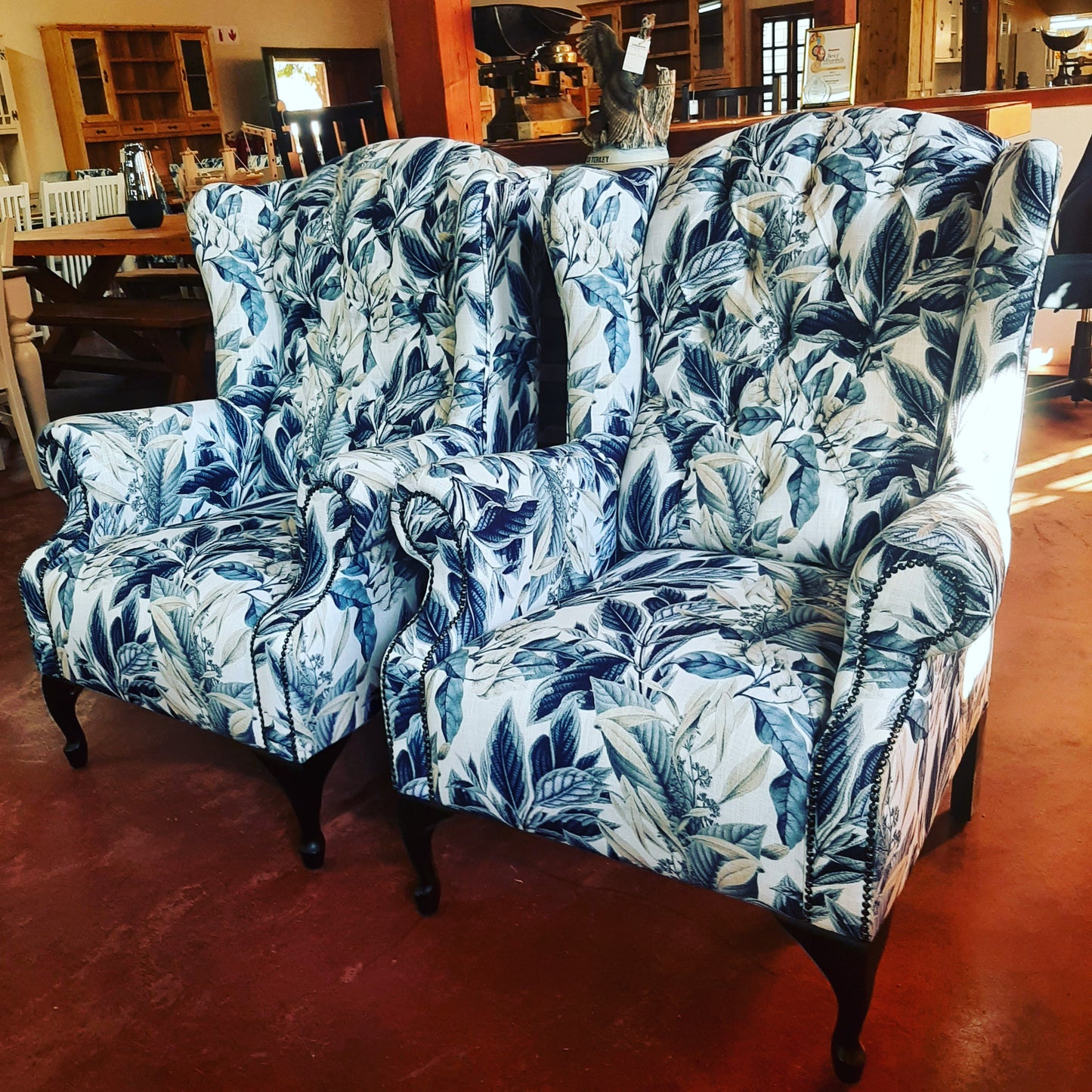 Deep buttoned Floral blue Wingback chair