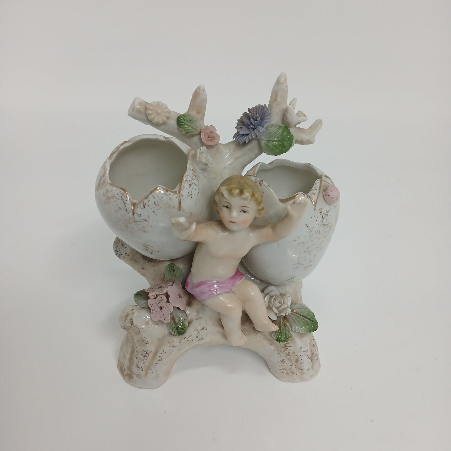 Egg shells & baby Capodimonte figurine