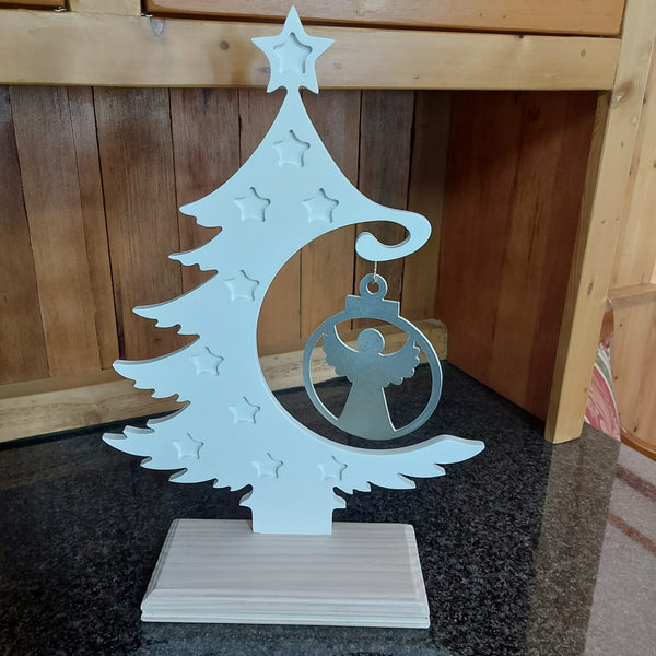 White painted tree with an angel deco