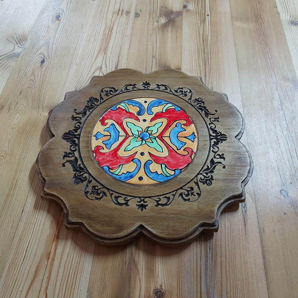 Engraved ornate board with tile