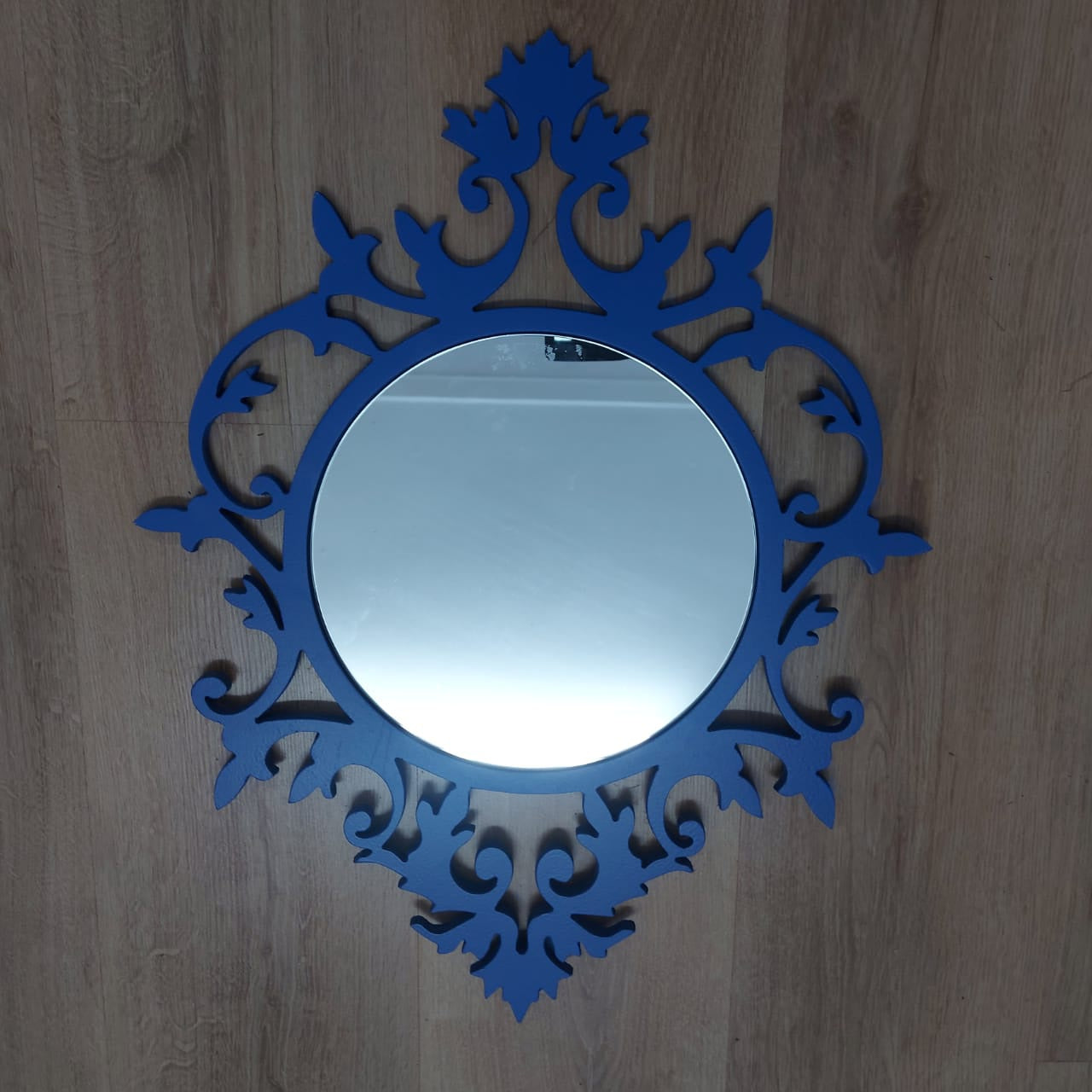 Blue round mirror