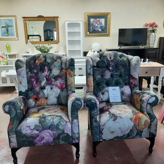 Wing back chair with flowers